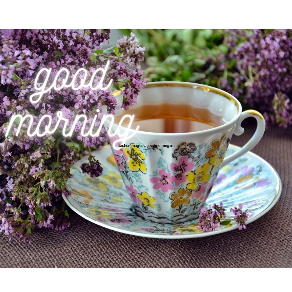 flower design print on cup with steam cup and good morning