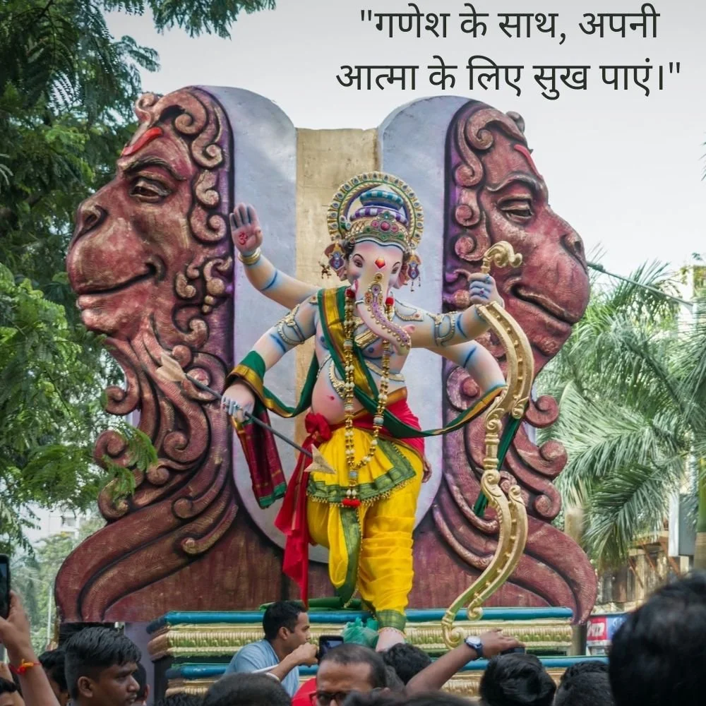 Ganesh ji big stachu is displayed behind the Ganesh 2 hanuman ji stachu is placed. many thinks in the Ganesh ji hand.