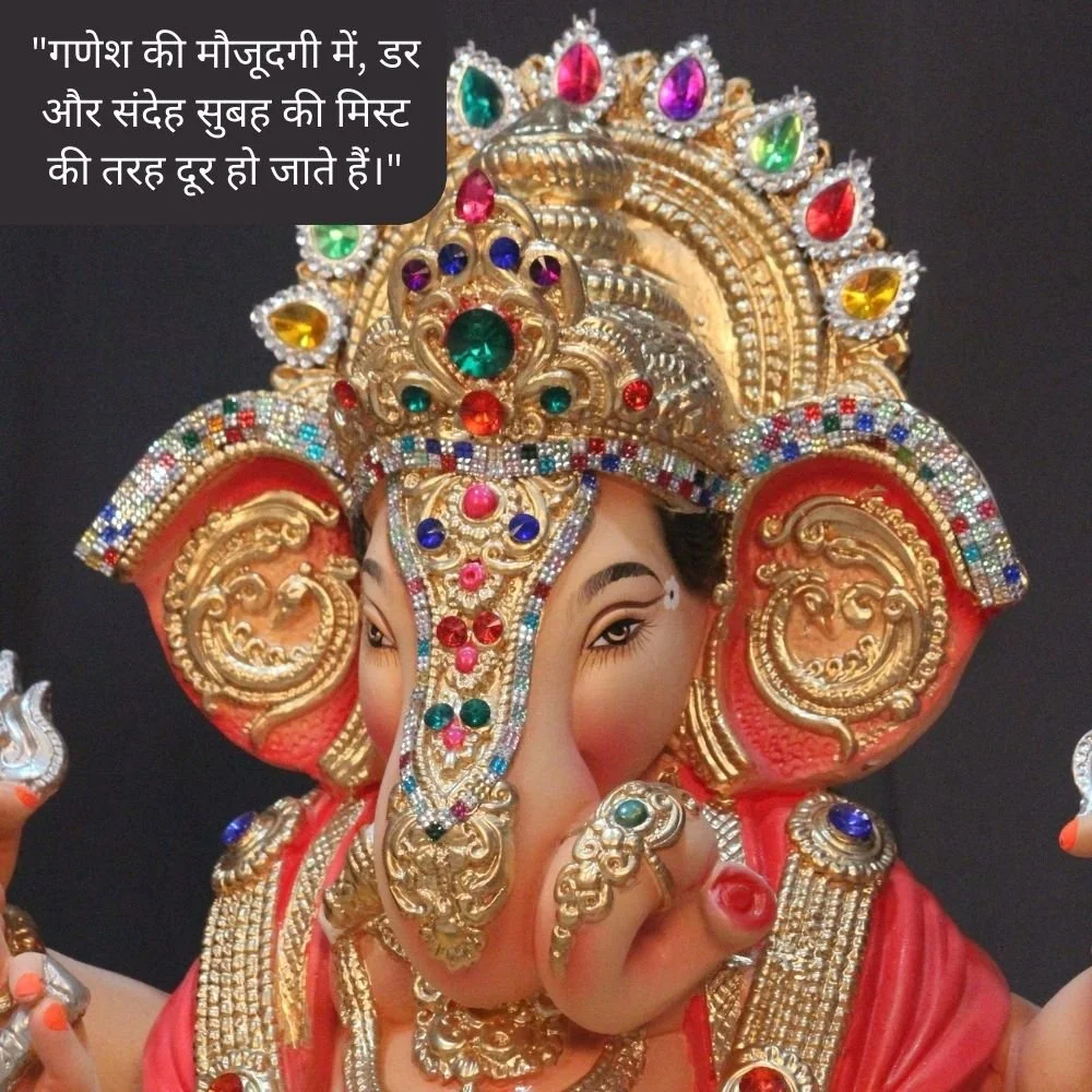 Creme color ganesh stachu with golden crown with embroidered many stores, Ganesh ji wear jewellery with embroidered stores. Spiritual quote is placed, behind the ganesh ji dark black background is help to more enhance the ganesh ji