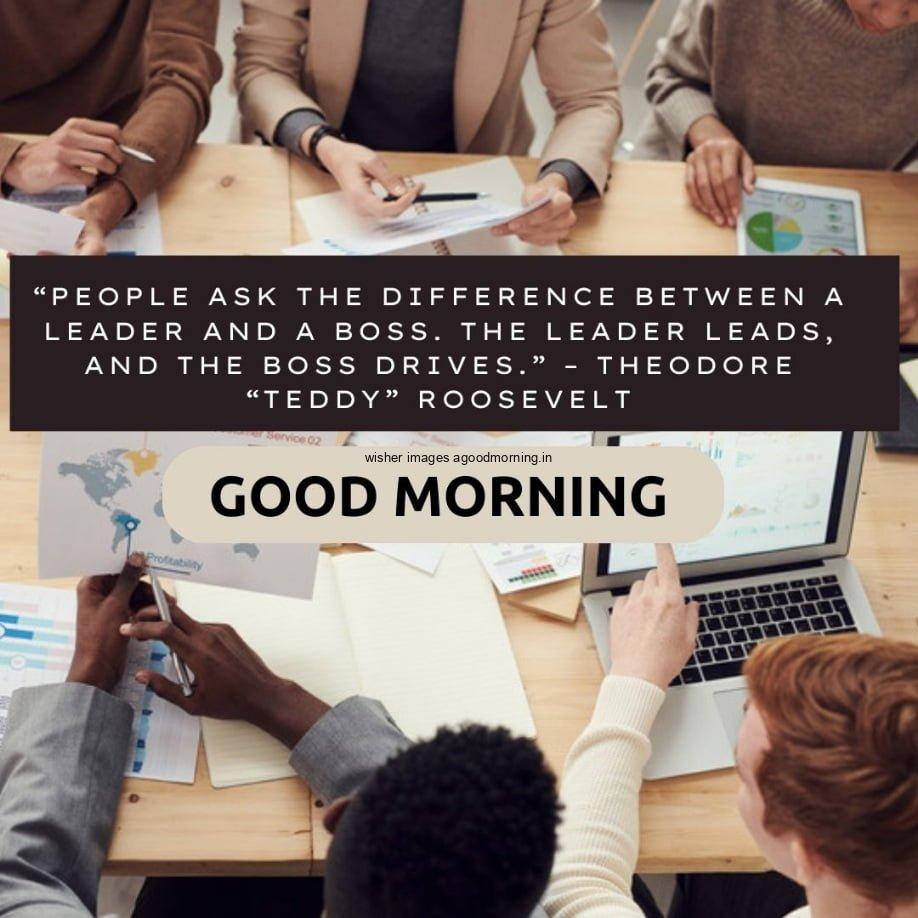 Team doing the meeting on the brown table while siting on chair, good morning team quote is placed