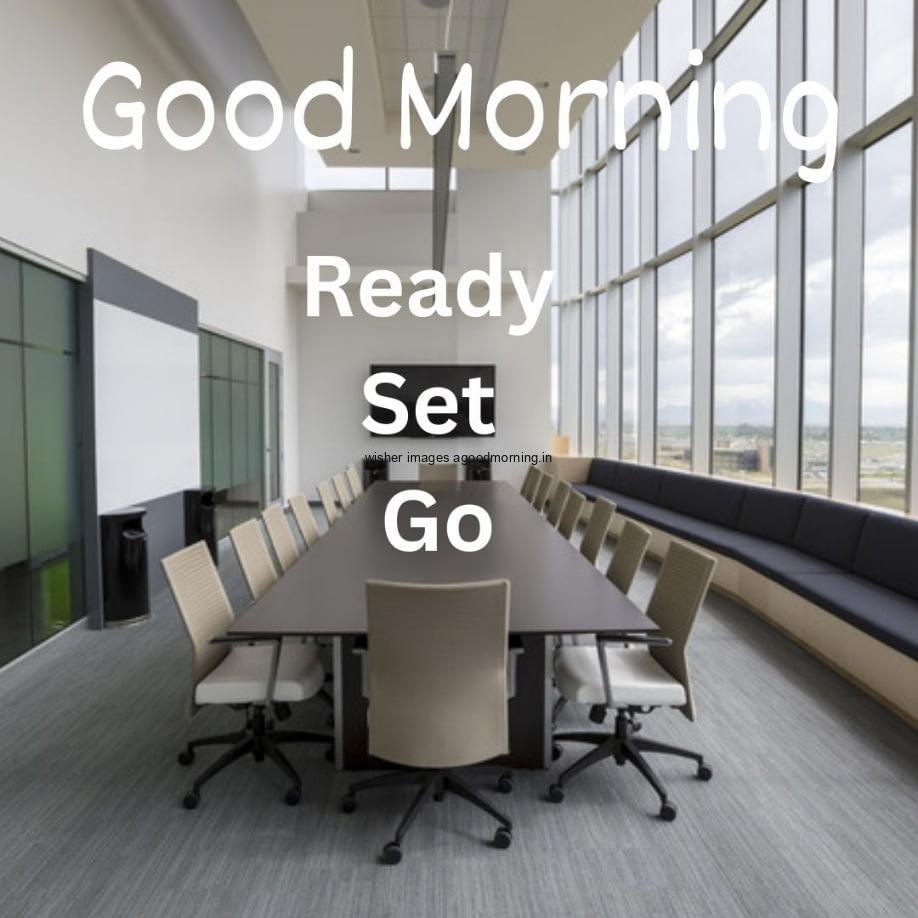 meeting room with windows is visible, where many chairs is placed, good morning quote is placed