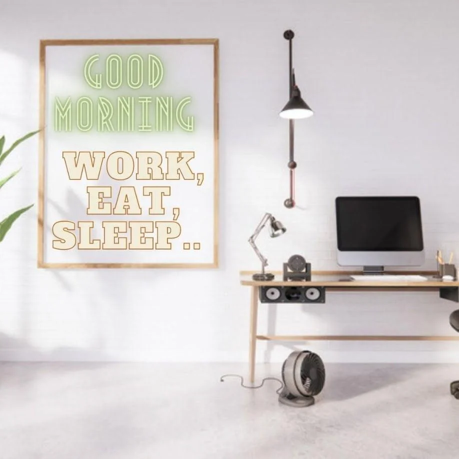 quote is placed on White wall and PC is on the table good morning and quotes is placed