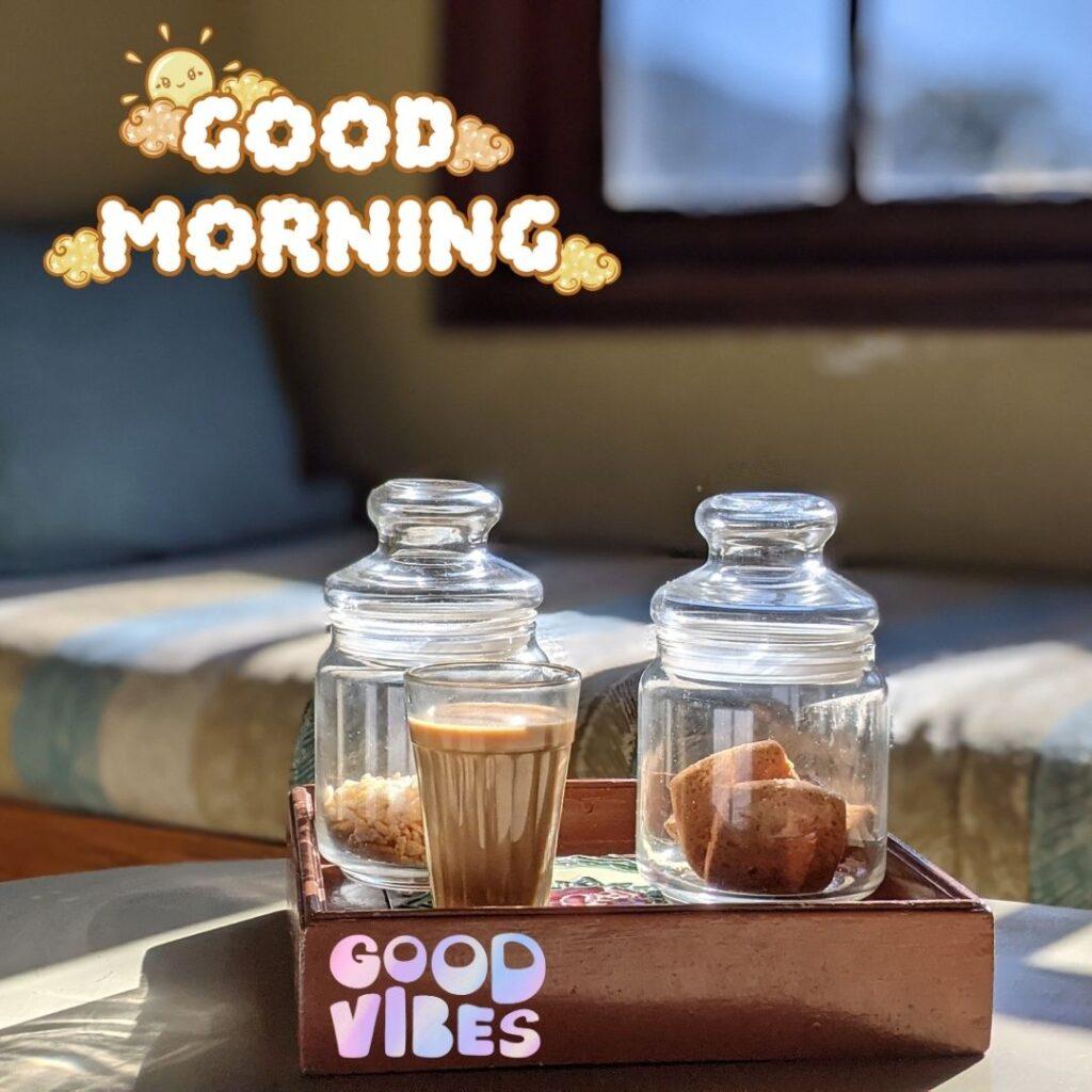 transplant  jar with chai in the glass, good morning and good vibes quote is placed