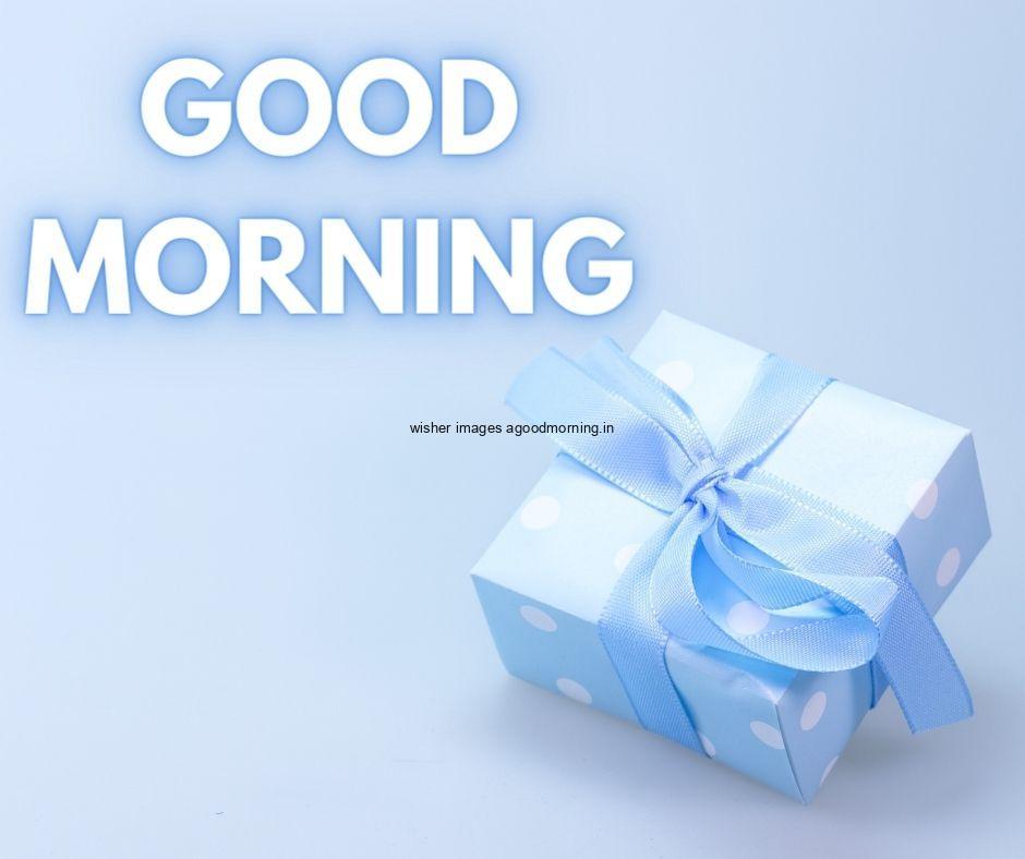 Blue colour background with breautiful sky blue colour gift with sky ribbon box good morning images box