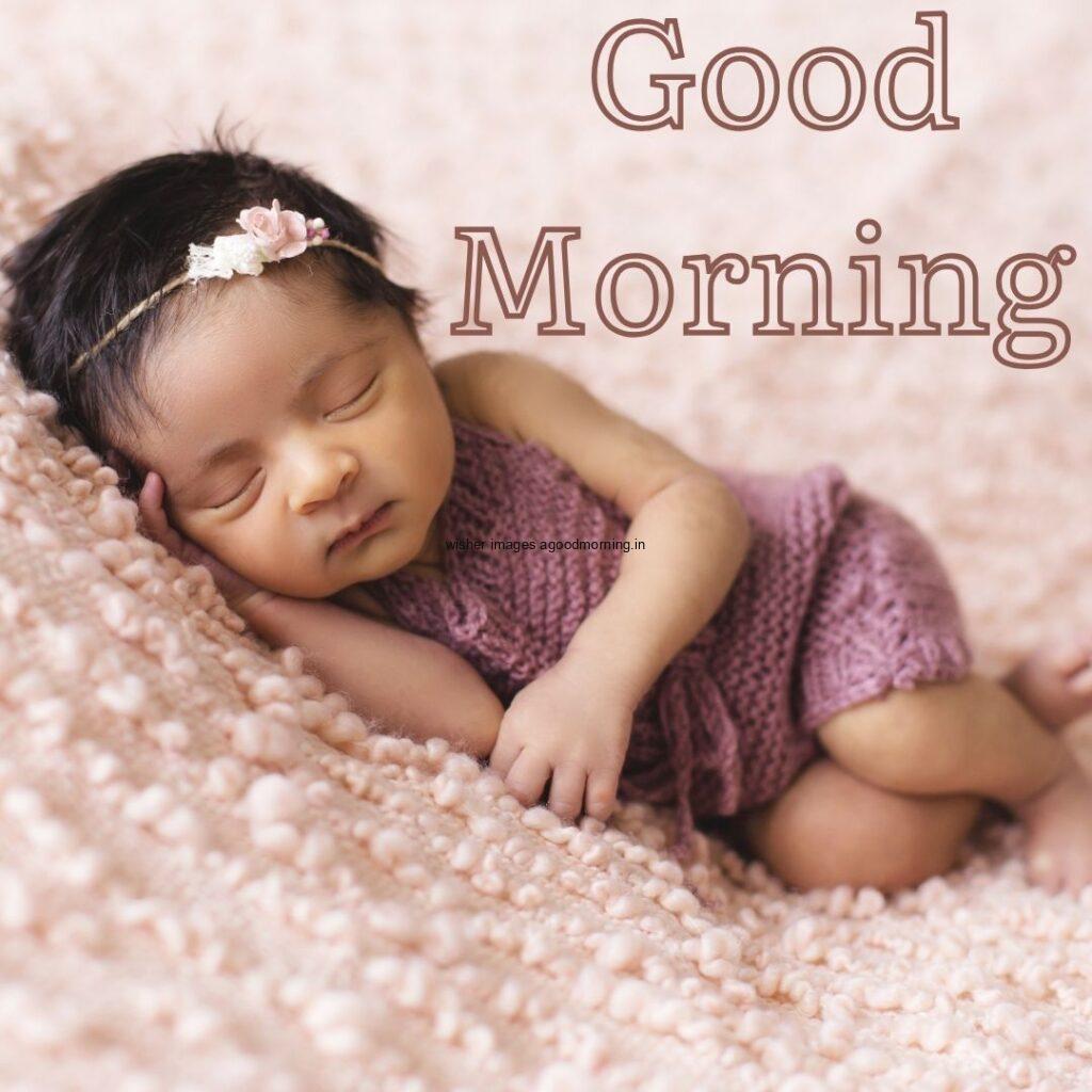 Brown girl sleeping and wearing the purple dress good morning quote is placed