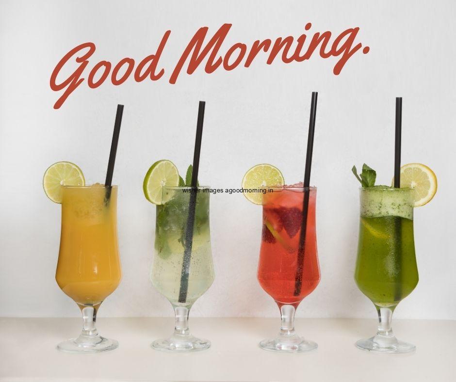 Four-juice-glassess-with-Grey-background-with-good-morning-text-good-morning-image-half-cutting-fruit HD Good Morning Food Images Free download