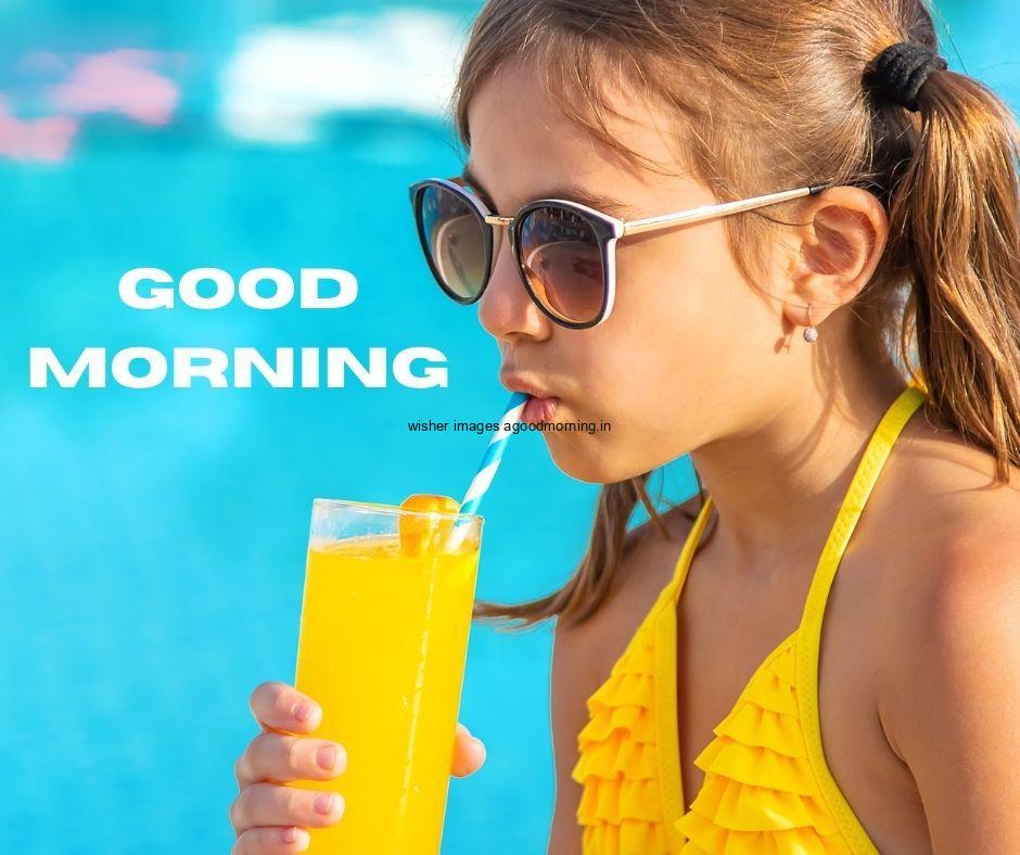 Good Morning food images with orange jucie with girl sky blue background with good morning Food image