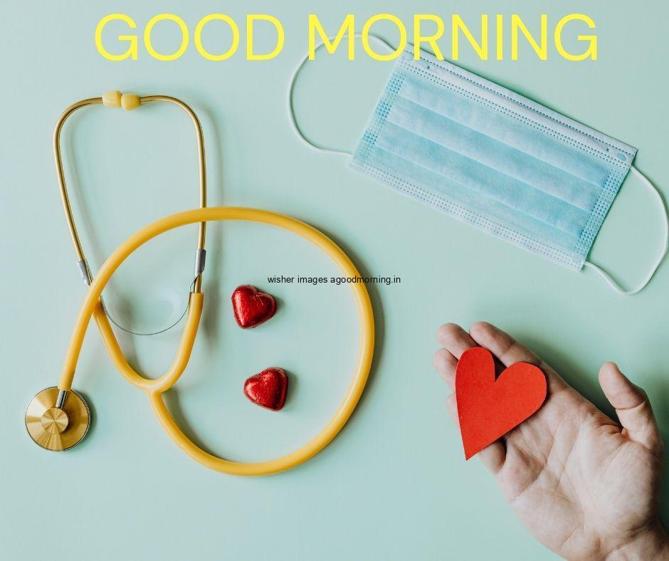 Green background with tellis scope with red heart good morning images