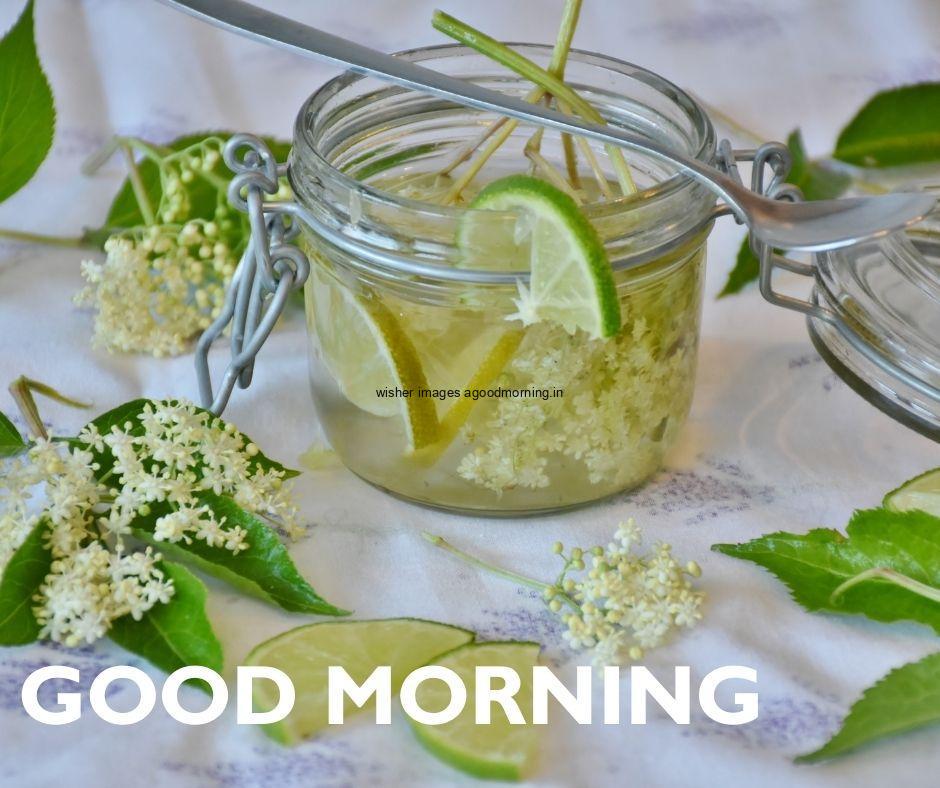 Grey-background-white-flowers-in-the-glass-jar-good-morning-colour-white-text HD Good Morning Images with juices Free