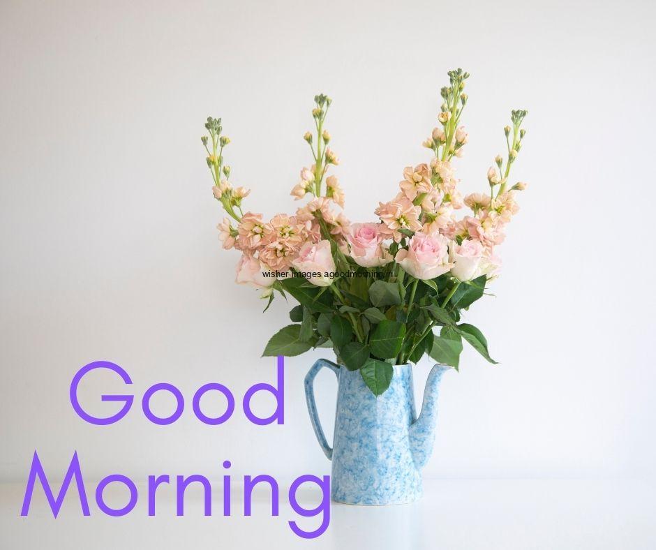 Grey-background-with-blue-vase-and-beautiful-flowers-good-morning-flower-images-quote-is-placed 60+ Good Morning Flowers images download & share