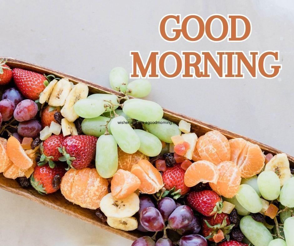 Grey background with orange fruit, strawberry purple berry good morning image text colour yellow with white border