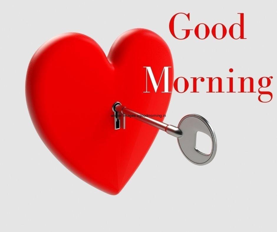 Grey background with red heart key placed in the heart good morning love image