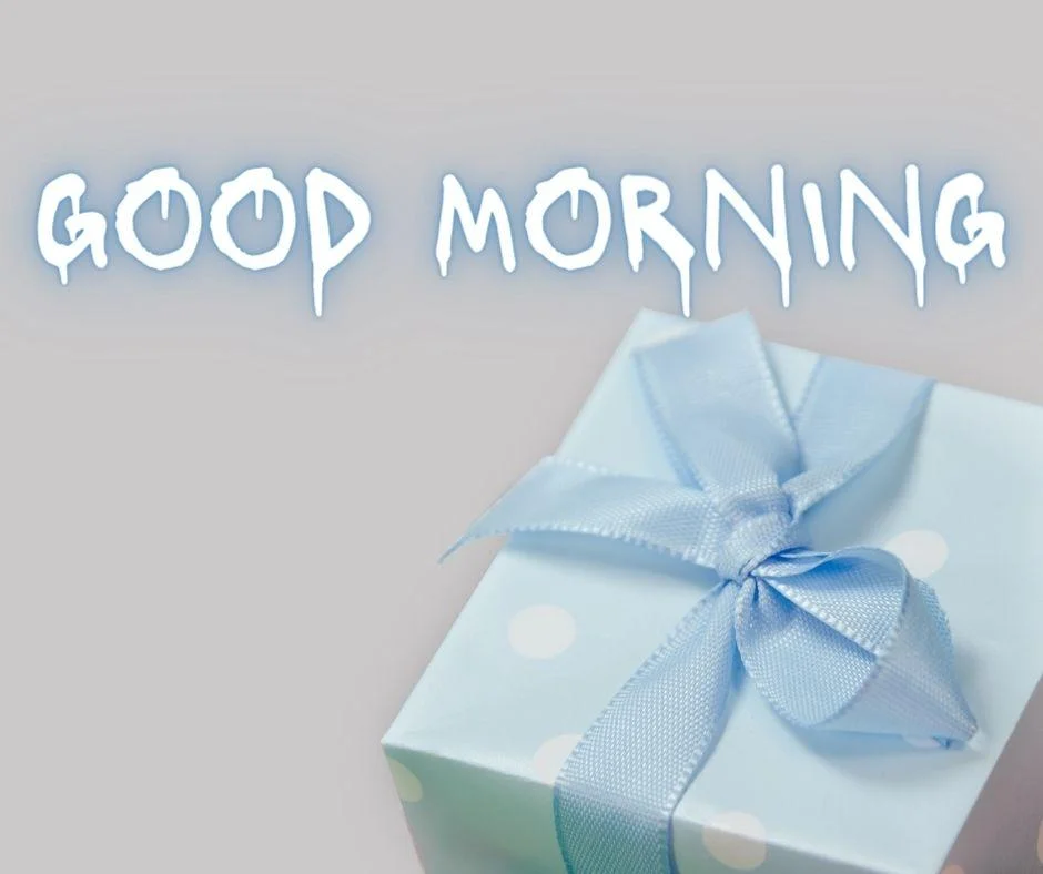 Grey colour background with breautiful light blue colour gift box with light blue ribbon good morning images box