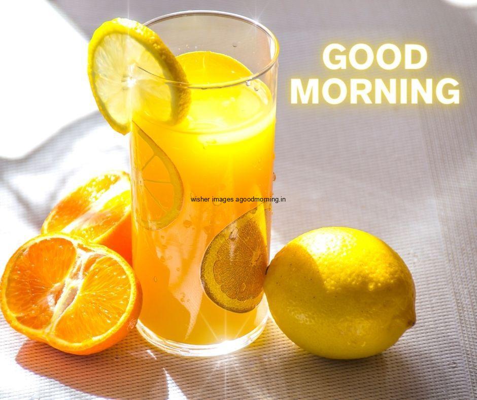 Grey with white background with orange and lemon in juice good morning image text colour yellow with white border