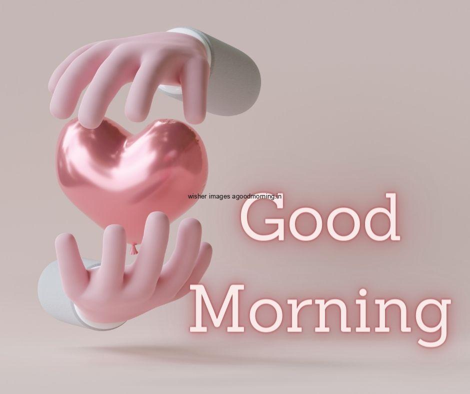 Heart in the middle hands pink text is placed with dark grey background good morning images