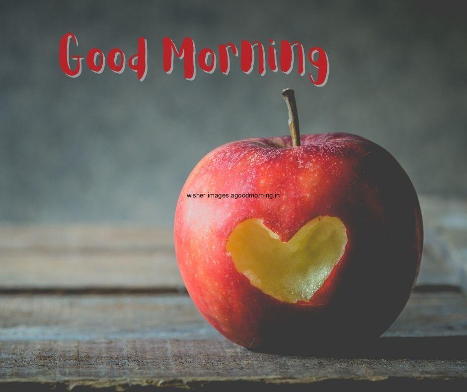 Heart shape cut in the Apple black shape good morning images