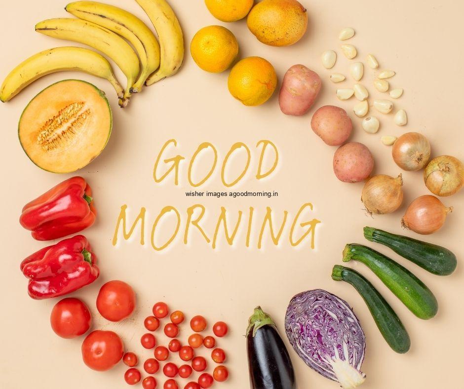 Pink background with orange, banana chilly fruit and vegitable create cricle good morning image text colour yellow with white border