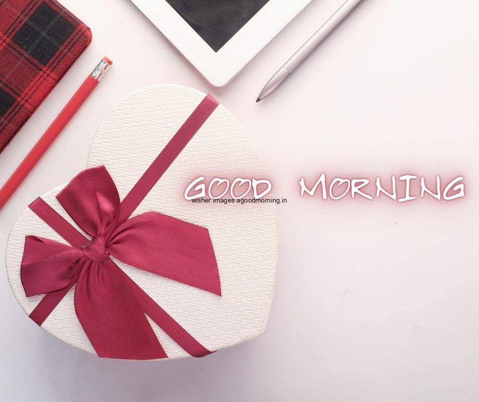 Pink colour background with breautiful pink colour gift box good morning images box