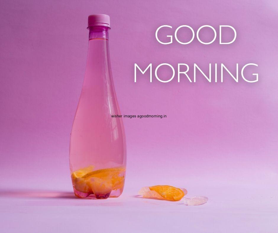 Purple-background-juice-bottles-in-orange-white-text-good-morning-image HD Good Morning Images with juices Free