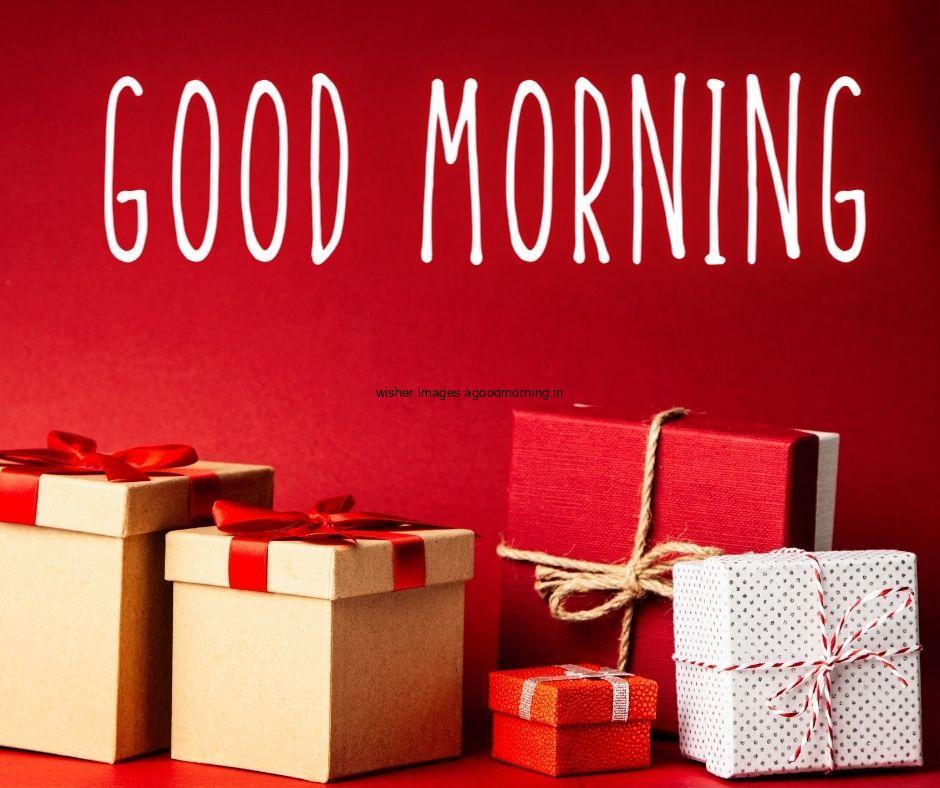 Red colour background with breautiful brown,red,white colour gift boxes good morning images box