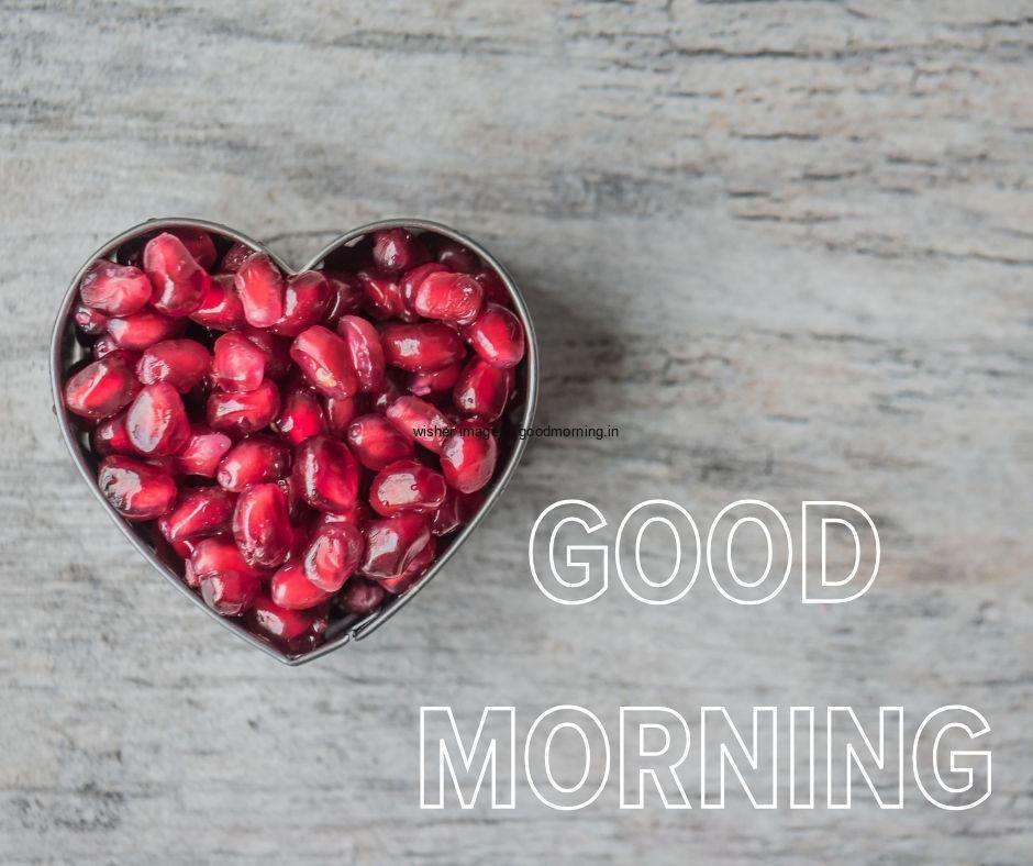 Red heart Created with bowl in the bowl fruit seeds is placed grey wooden texture in the background good morning love images free download