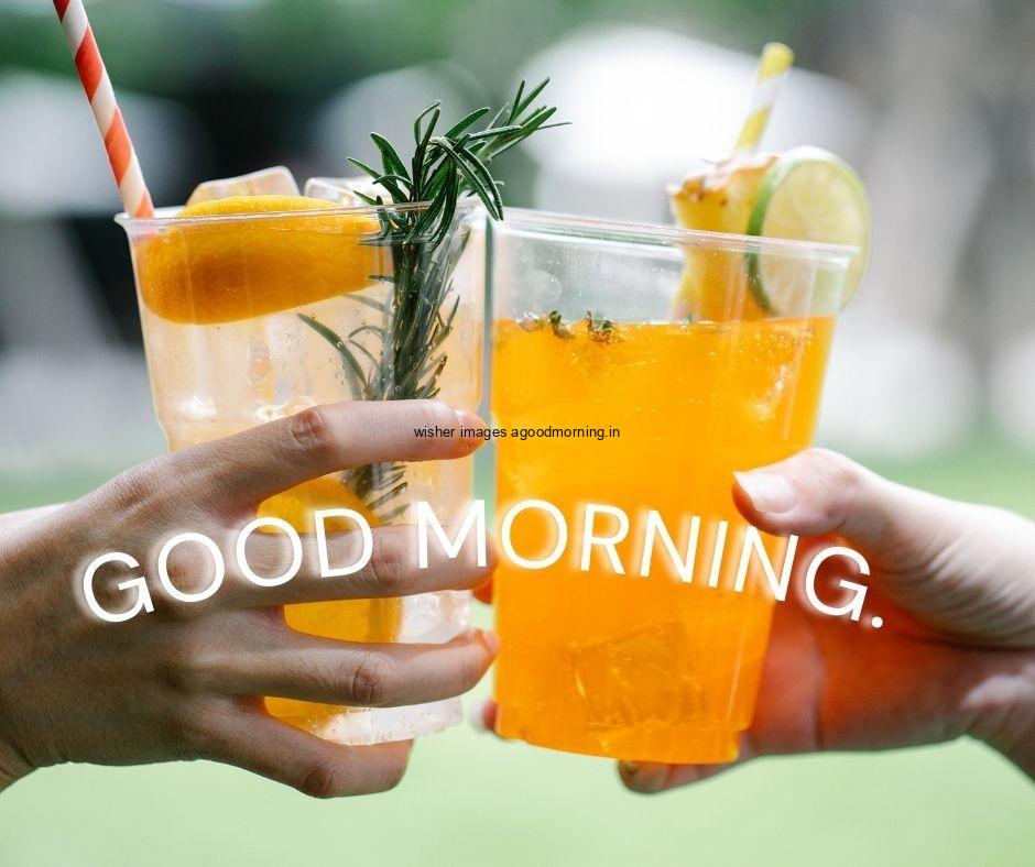 Two jucie chress with Good Morning food images with Orange juice white with fruit background with good morning Food image