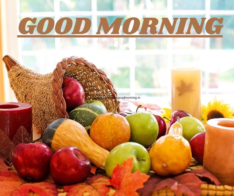 White background with orange good many fruit in the glass with baskit morning image text colour yellow with white border