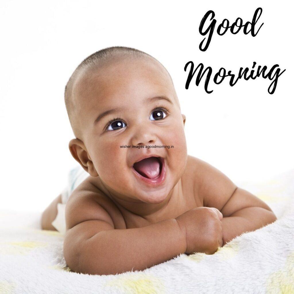 Brown baby smile good morning quote is placed