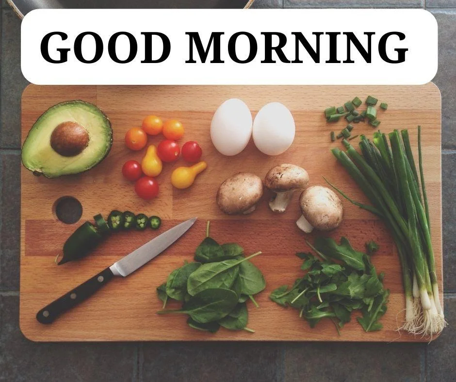 Brown chop board is placed on the board many vegetable with knife good morning quote is placed