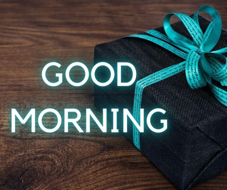 brown-table-style-background-with-breautiful-dark-black-colour-gift-boxes-with-purple-aqua-ribbon-good-morning-images-box 69+ Good Morning Images With Gift Boxes