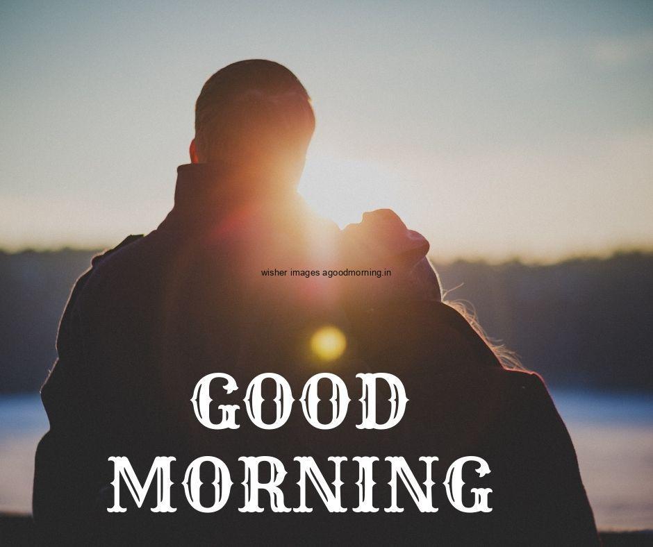 Couple shadows is makes hug good morning quote is placed middle white colour