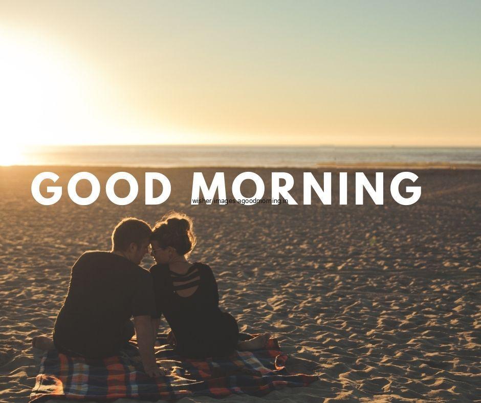 Couple siting on the beach and enjoy the sun rise good morning white colour