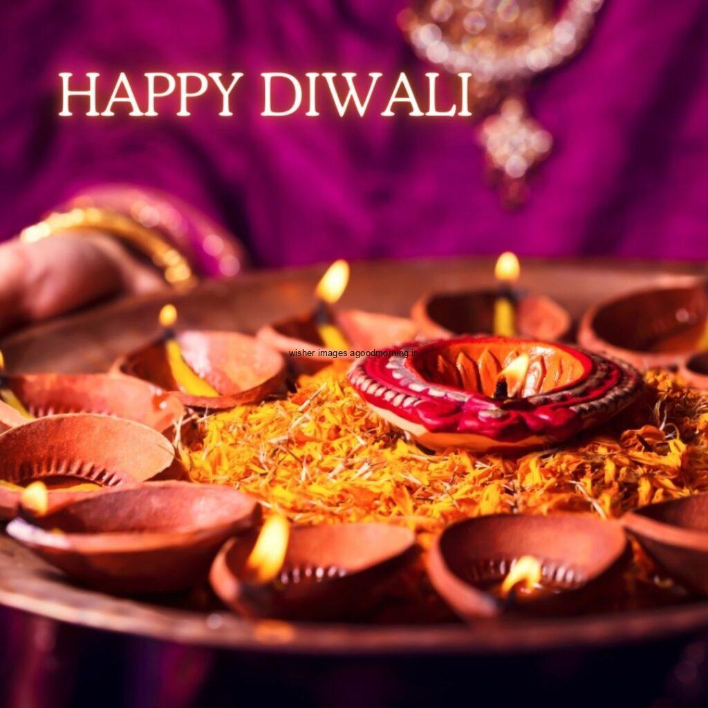 desi diya with beautiful plates with diya happy diwali images