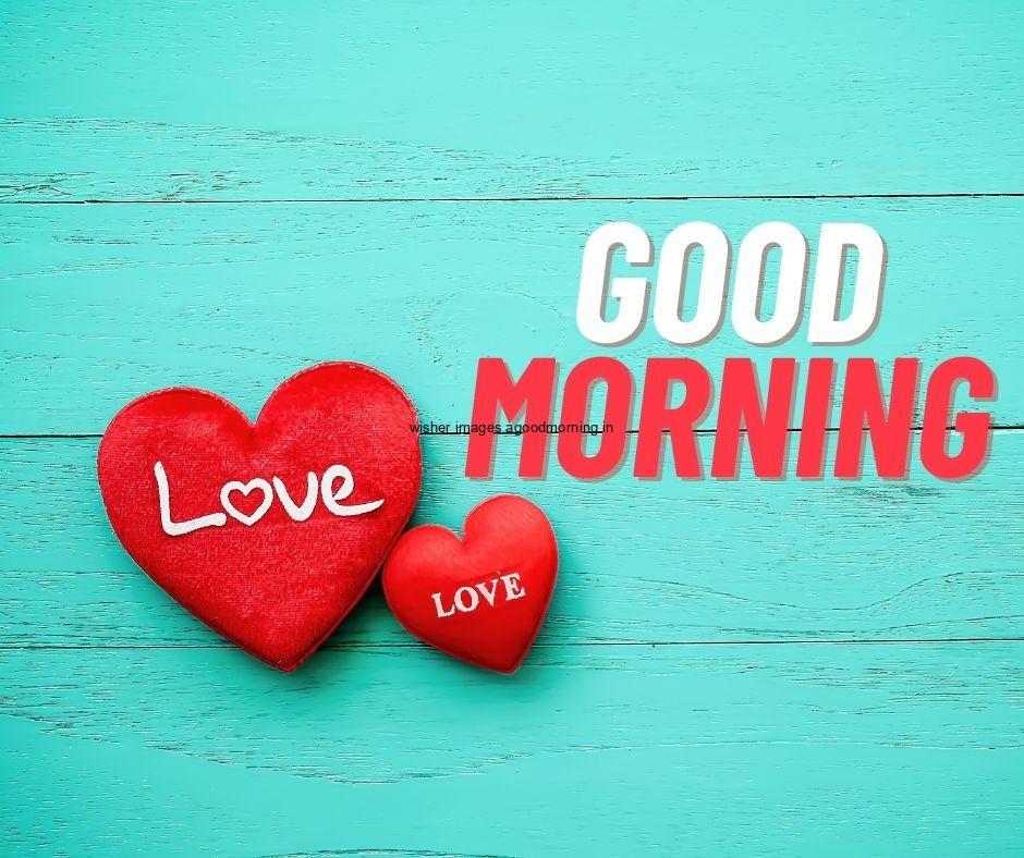 Double hearts with aqua colour background white and red colour good morning quote is placed