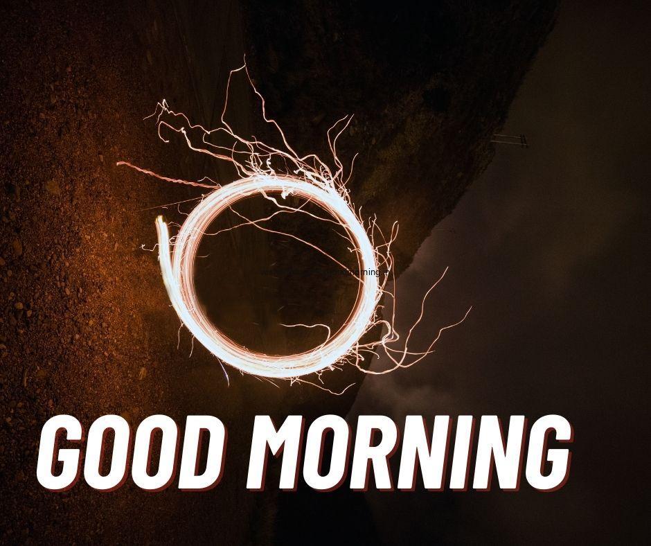 fire create in circle shape beautifull blackground white text good morning images