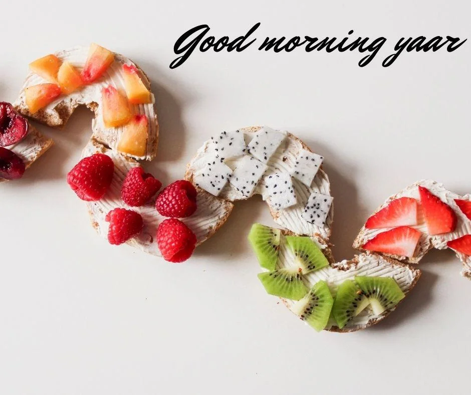 Fruits placed on the image good morning images quote is placed on the image