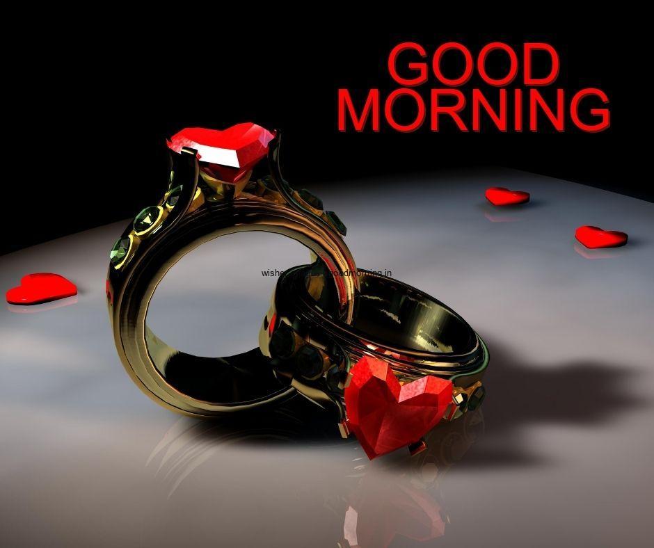 Golden with red rings, grey background is setup good morning quote is placed