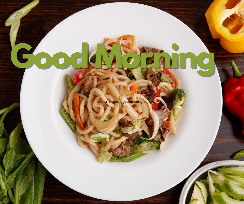 Good morning food images for couple noodle in white plate .text colour is green white noddle on the plate