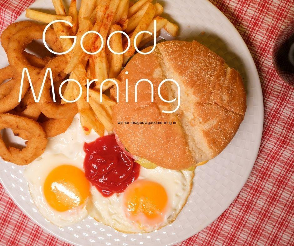 Good morning food quote is paced brown plate on fast food burger on eggs