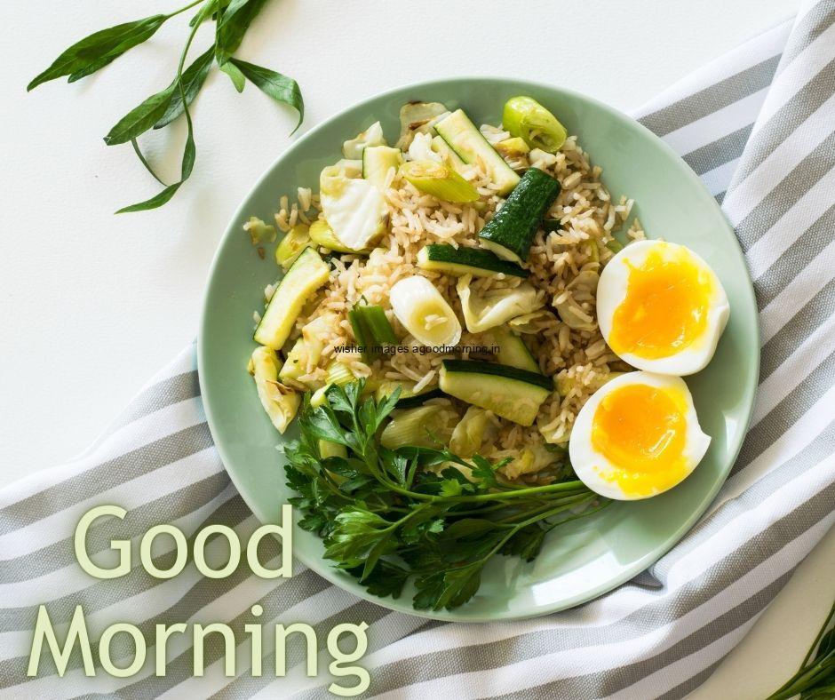 Good morning food quote is paced, vegetable and egg on green plate with clothes