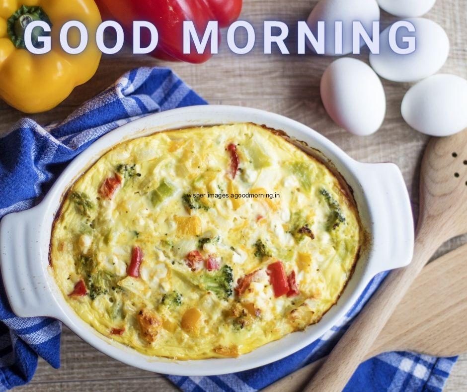 good morning quote is placed in blue lights with white bowl on healthy food beside the eggs is placed with yellow and red Capsicum