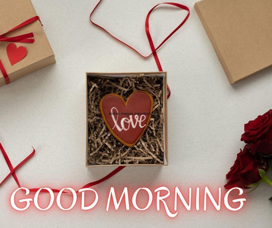 grey colour background with breautiful brown colour gift boxes open box and placed love good morning images box