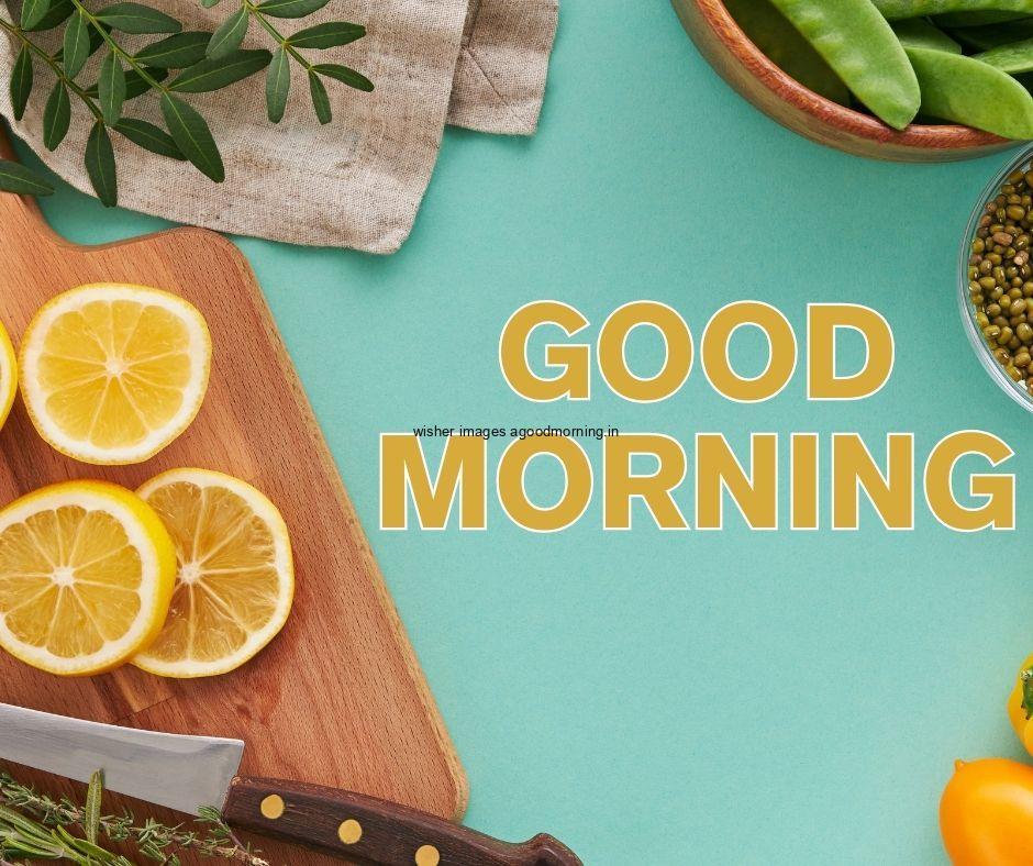 light Green background with orange, yellow capsicum knife good morning image text colour yellow with white border