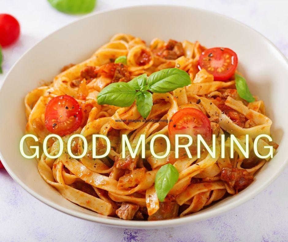 Paste with vegetables in white bowl good morning food quote is placed