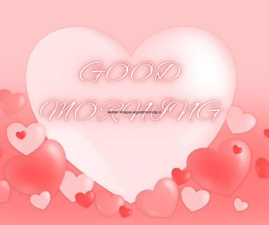 Pink background with light colour hearts good morning quote is placed