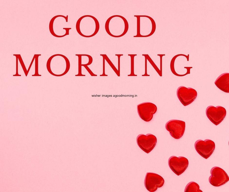 Pink background with red heart good morning quote is placed text colour is red