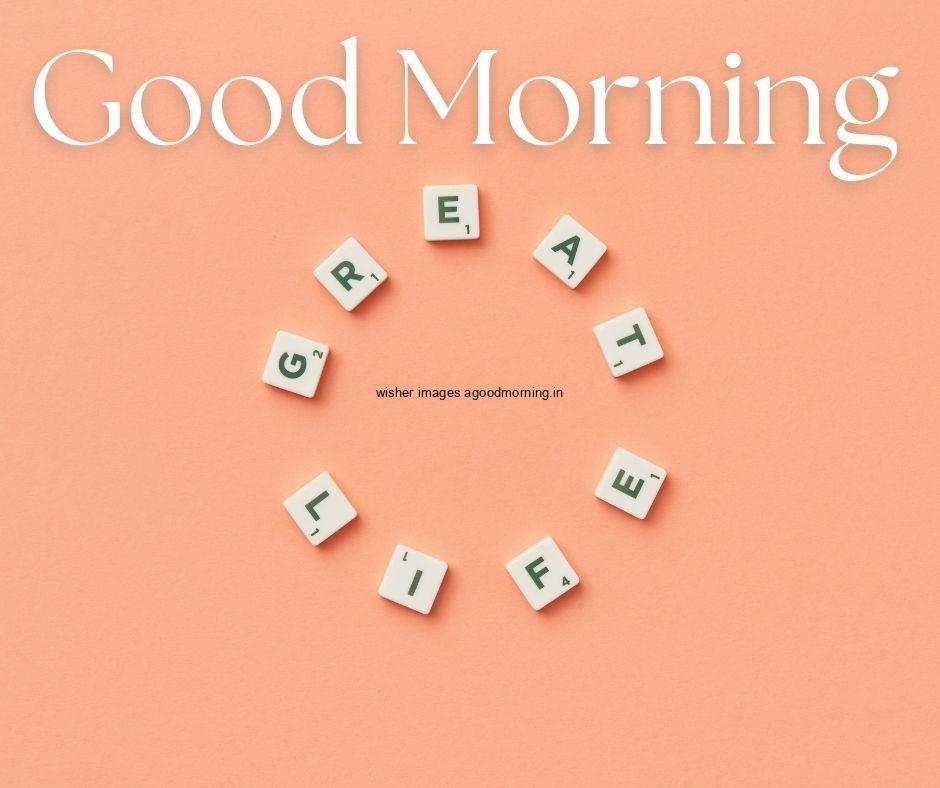 Pink background with great life words placed as circle create your moment with good morning images