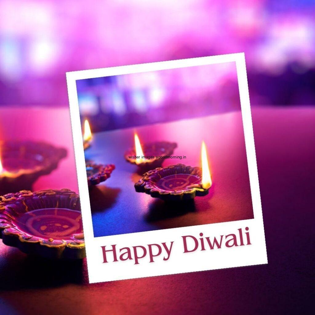 purple background diya with rangloi happy diwali images with blue background