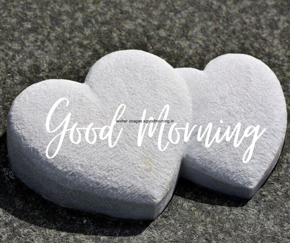 two stone with dark grey background white good morning text is placed