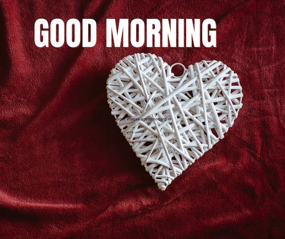 White hearts with red colour background, white colour good morning quote is placed